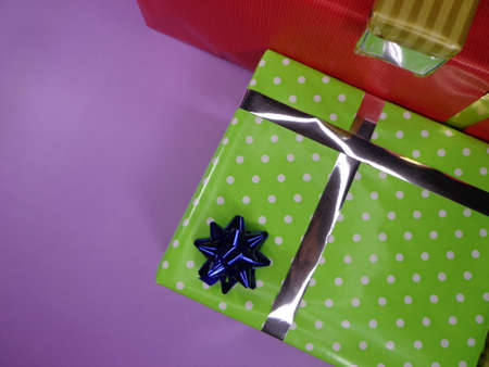Well decorated gifts on colored backgrounds