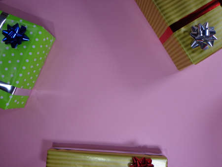 Well decorated gifts on colored backgroundsの写真素材