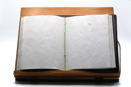 Open notebook on lectern, isolated with blank space for textの写真素材