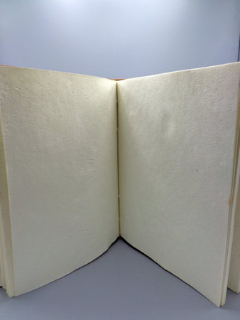 Open notebook, on lectern with blank space for textの写真素材