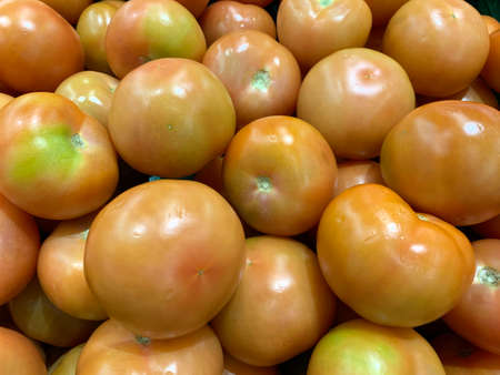 Close-up of a pile of tomatoesの写真素材