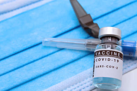 Covid vaccine dose on a mask