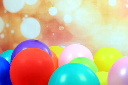 Colored balloon pool with a sparkling backgroundの写真素材
