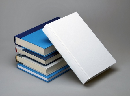 Plain white book and four colour booksの写真素材