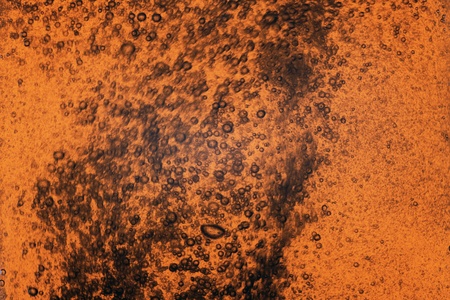 Dark beer dewy glass textureの写真素材