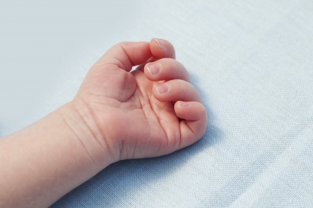 Hand of the new born boyの写真素材