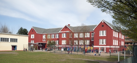 Historic school with a playgroundのeditorial素材