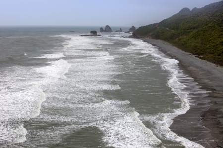 New Zealand - Tasman Sea and rocky beach by Jackson Head, Jackson bay Oahuの写真素材
