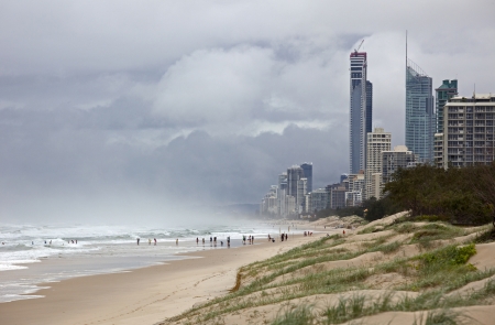 Australia - beach of Tasman Sea with stormy clouds and wavesの写真素材