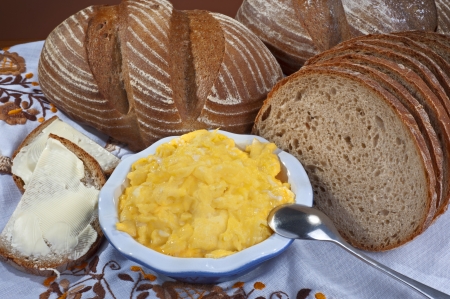 Eggs - scrambled wggs with bread and butterの写真素材