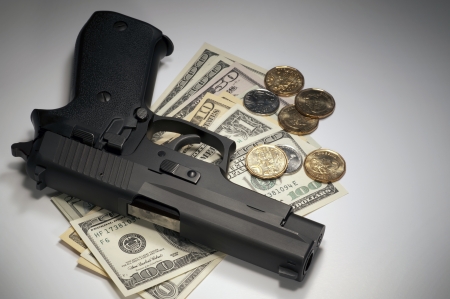Gun and moneyの写真素材