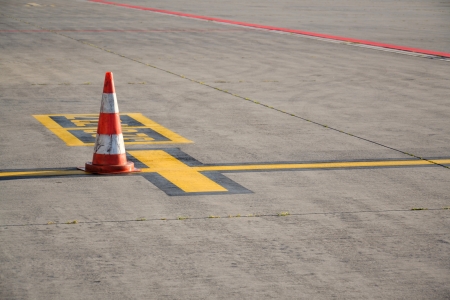 Traffic cone on the airport Ruzyne, Czech republic.のeditorial素材