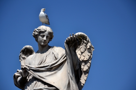 Angel with the Sudarium on the Sant Angelo bridge in Rome.の写真素材