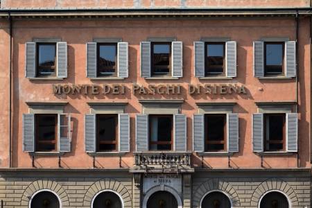 Pisa, Italy - July 16, 2012: Bank Monte dei Paschi di Siena in Pisa, Italy. Monte dei Paschi di Siena is the oldest surviving bank in the world founded in 1472. Moody's cut the rating of bank and said it may need more state aid.のeditorial素材