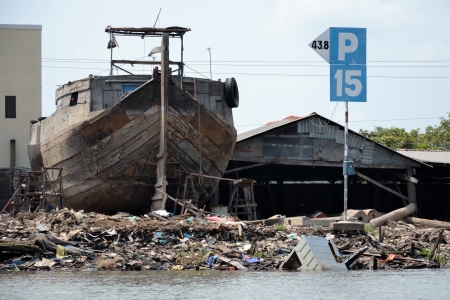 My Tho, Vietnam - February 14, 2012: Boat under repair on February 14, 2012 in My Tho, Vietnam. Government will set up forces to protect vietnamese fisheries and sovereignty on sea for early next year.のeditorial素材