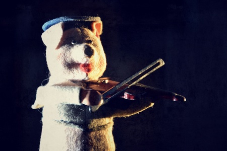 Filtered picture of a vintage teddy toy の写真素材