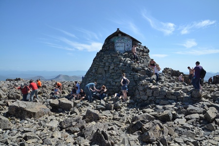 BEN NEVIS, UNITED KINGDOM - JULY 19  People hiking on the Ben Nevis summit on 19 July 2013 in Fort William, Scotland, UK のeditorial素材