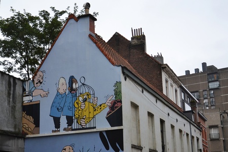 BRUSSELS, BELGIUM - JULY 11: Filtered picture of a comic strip mural painting on July 11, 2014 in Brussels, Belgium. Brussels is known as a homeland of the comic strips and is full of images of numerous comic strip heroes.のeditorial素材