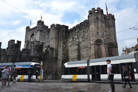 GHENT, BELGIUM - JULY 13: Tourists walk in front of the Gravensteen Castle on July 13, 2014 in Ghent, Belgium.のeditorial素材