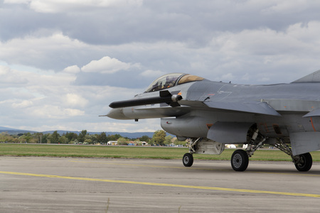 HRADEC KRALOVE, CZECH REPUBLIC - SEPTEMBER 5: Landing F-16 Fighting Falcon with Belgian flag on the...