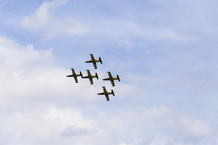 HRADEC KRALOVE, CZECH REPUBLIC - SEPTEMBER 5: Baltic Bees Jet Team flying at the CIAF - Czech international air fest on September 5, 2015 in Hradec Kralove, Czech republic.のeditorial素材