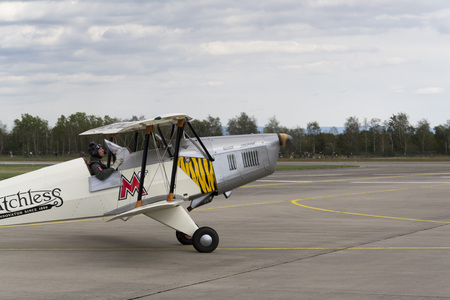 HRADEC KRALOVE, CZECH REPUBLIC - SEPTEMBER 5: German training aircraft BÃ¼cker BÃ¼ 131 Jungmann used by Luftwaffe during World War II lands on the CIAF - Czech international air fest on September 5, 2015 in Hradec Kralove, Czech republic.のeditorial素材