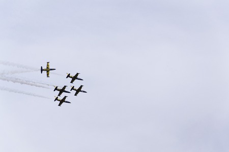 HRADEC KRALOVE, CZECH REPUBLIC - SEPTEMBER 5: Baltic Bees Jet Team flying at the CIAF - Czech international air fest on September 5, 2015 in Hradec Kralove, Czech republic.のeditorial素材