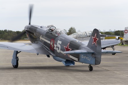HRADEC KRALOVE, CZECH REPUBLIC - SEPTEMBER 5: World War II Soviet fighter Yakovlev Yak-3 on runway at the CIAF - Czech international air fest on September 5, 2015 in Hradec Kralove, Czech republic.のeditorial素材