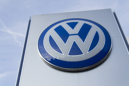 PRAGUE, CZECH REPUBLIC - SEPTEMBER 5: Volkswagen carmaker logo on a building of dealership on September 24, 2015 in Prague, Czech republic. Great emission scandal raises around number of Volkswagen Group cars with the EA189, 2.0 litre TDI engine.のeditorial素材