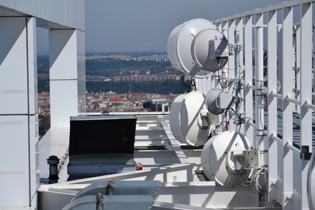 Bunch of transmitters and aerials on the skyscraper in Prague, Czech Republicの写真素材