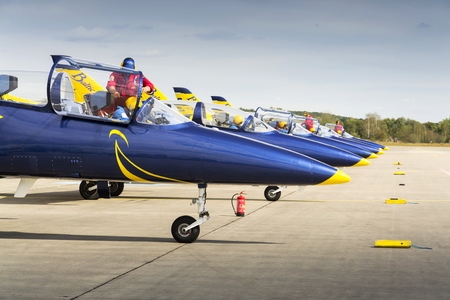HRADEC KRALOVE, CZECH REPUBLIC - SEPTEMBER 5: Baltic Bees Jet Team with Aero L-39 Albatros planes standing on a runway at the CIAF - Czech international air fest on September 5, 2015 in Hradec Kralove, Czech republic.のeditorial素材