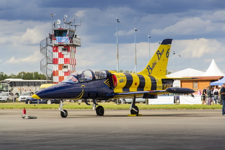 HRADEC KRALOVE, CZECH REPUBLIC - SEPTEMBER 5: Baltic Bees Jet Team with Aero L-39 Albatros planes standing on a runway at the CIAF - Czech international air fest on September 5, 2015 in Hradec Kralove, Czech republic.のeditorial素材