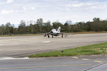 HRADEC KRALOVE, CZECH REPUBLIC - SEPTEMBER 5: Jet fighter aircraft Mikoyan-Gurevich MiG-15 developed for the Soviet Union rolling on runway on September 5, 2015 in Hradec Kralove, Czech republic.のeditorial素材