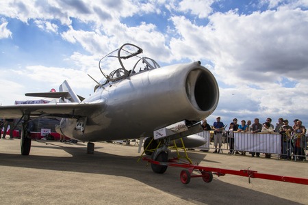 HRADEC KRALOVE, CZECH REPUBLIC - SEPTEMBER 5: Jet fighter aircraft Mikoyan-Gurevich MiG-15 developed for the Soviet Union standing on runway on September 5, 2015 in Hradec Kralove, Czech republic.のeditorial素材