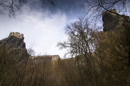 Bosky ruins of castle Trosky in Czech Republic on winter dayの写真素材