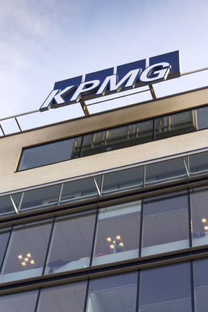 PRAGUE, CZECH REPUBLIC - MARCH 31: Professional service company KPMG logo on the building of the Czech headquarters on March 31, 2016 in Prague, Czech republic.のeditorial素材