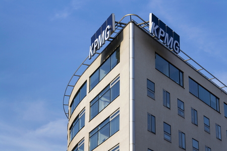 PRAGUE, CZECH REPUBLIC - MARCH 31: Professional service company KPMG logo on the building of the Czech headquarters on March 31, 2016 in Prague, Czech republic.のeditorial素材