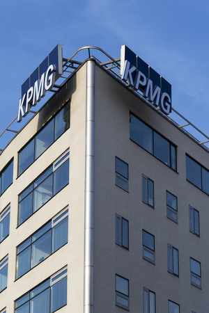 PRAGUE, CZECH REPUBLIC - MARCH 31: Professional service company KPMG logo on the building of the Czech headquarters on March 31, 2016 in Prague, Czech republic.のeditorial素材