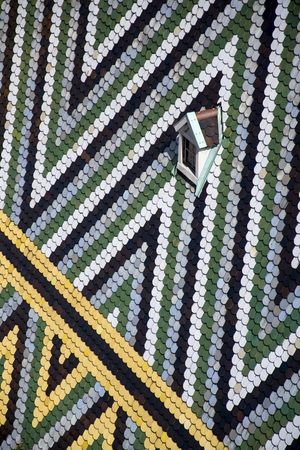 Mosaic roof patern of the St. Stephens Cathedral (Stephansdom) in Vienna, Austriaの写真素材