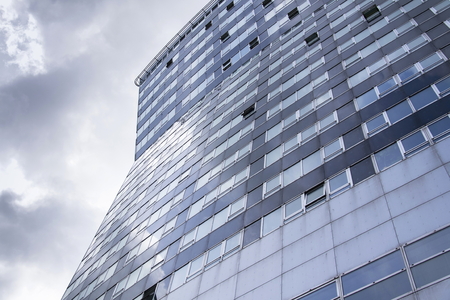 Modern office building in front of Gasometers of Vienna in Austriaのeditorial素材