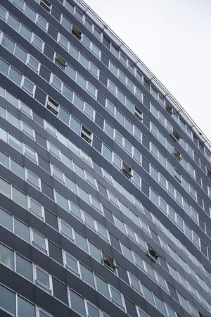 Modern office building in front of Gasometers of Vienna in Austriaのeditorial素材