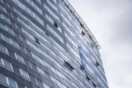 Modern office building in front of Gasometers of Vienna in Austriaのeditorial素材