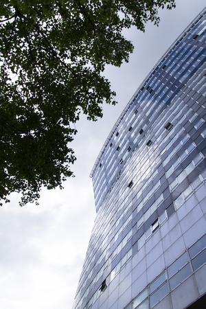 Modern office building in front of Gasometers of Vienna in Austriaのeditorial素材