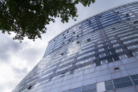Modern office building in front of Gasometers of Vienna in Austriaのeditorial素材