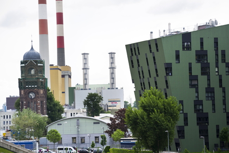 VIENNA, AUSTRIA - MAY 7: Modern residential apartments living house exterior near Gasometers of Vienna on 7 May 2012 in Vienna, Austria.のeditorial素材