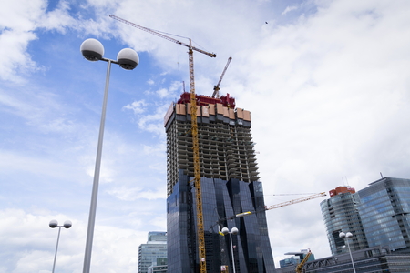 VIENNA, AUSTRIA - MAY 7: Crane on construction site of the DC Towers skyscraper â tallest skyscraper in Austria on 7 May 2012 in Vienna, Austria.のeditorial素材