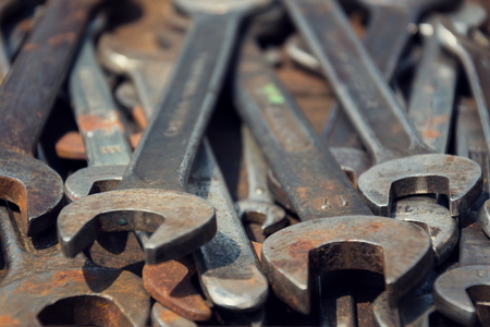 Loads of wrenches or spanners in a wooden drawerの写真素材