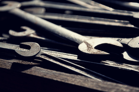 Loads of wrenches or spanners in a wooden drawerの写真素材