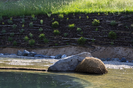 Textile fabric net in natural swimming pond for purifying plantsの写真素材