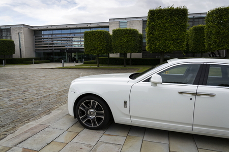 WESTHAMPNETT, UNITED KINGDOM - AUGUST 11: Rolls-Royce Ghost in front of the Goodwood plant on August 11, 2016 in Westhampnett, United Kingdom.WESTHAMPNETT, UNITED KINGDOM - AUGUST 11: Rolls-Royce Ghost in front of the Goodwood plant on August 11, 2016 in のeditorial素材